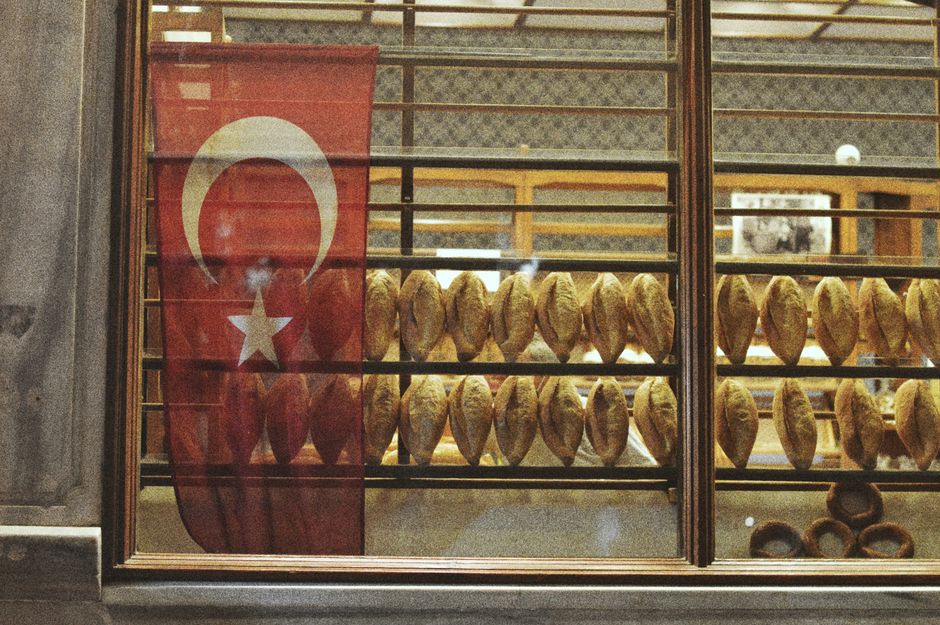 Rows of fresh bread in a bakery window
